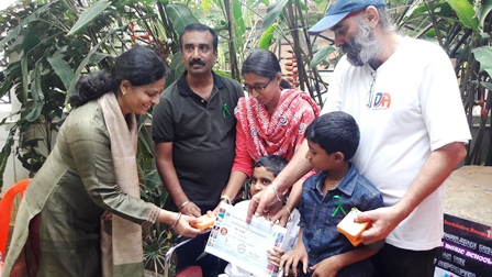 Prof Uma distributing medicines